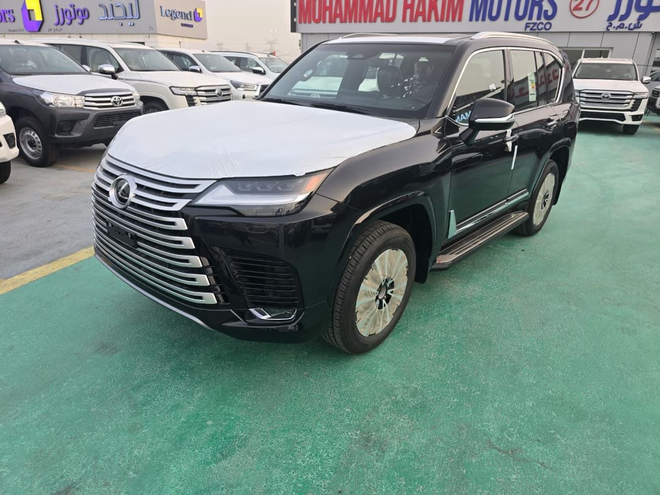 لكزس LX 700h Lexus LX 700h Hybrid 2026 – سيغنتشر فل أوبشن | أسود خارجي | داخلية حمراء