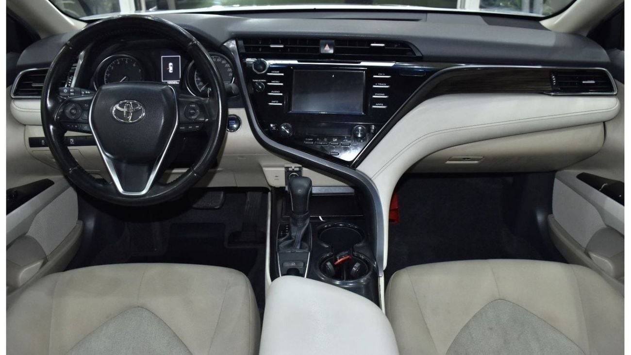 Toyota Camry EXCELLENT DEAL for our Toyota Camry SE ( 2019 Model ) in White Color GCC Specs