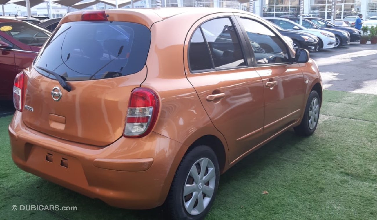 Nissan Micra GCC - orange color in silver - in excellent condition, do not need any expenses