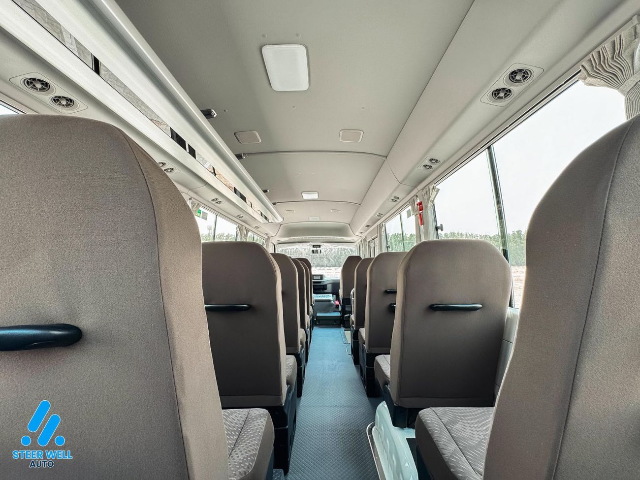 Toyota Coaster 23-Seater Bus 4.0L Diesel RWD GCC Specs Full Option White