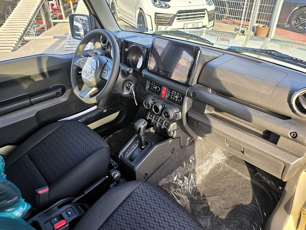 سوزوكي جيمني SUZUKI Jimny GLX 1.5L AT SUV 4WD 5Doors beige color with black roof gcc 2026 model