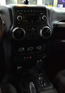 Jeep Wrangler EXCELLENT DEAL for our Jeep Wrangler Sport ( 2014 Model ) in Red Color GCC Specs