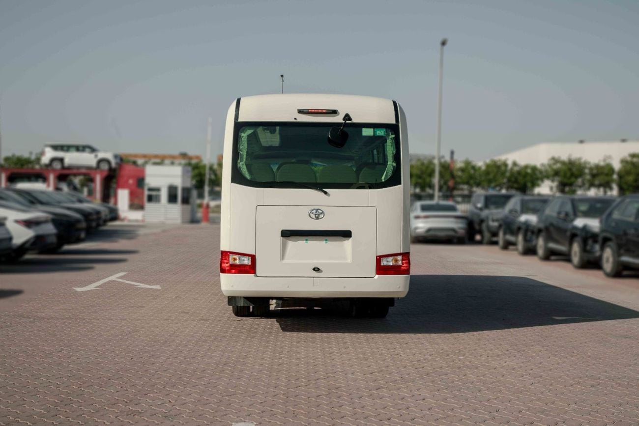 Toyota Coaster 2.7L (23-Seater) - White Inside Grey | Export Only