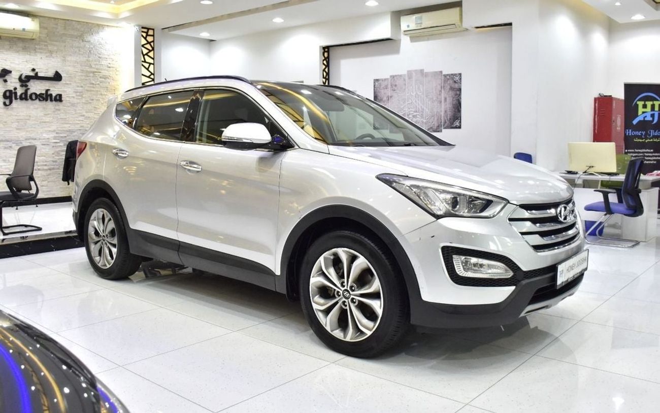 Hyundai Santa Fe EXCELLENT DEAL for our Hyundai SantaFe 4WD V6 ( 2016 Model ) in Silver Color GCC Specs