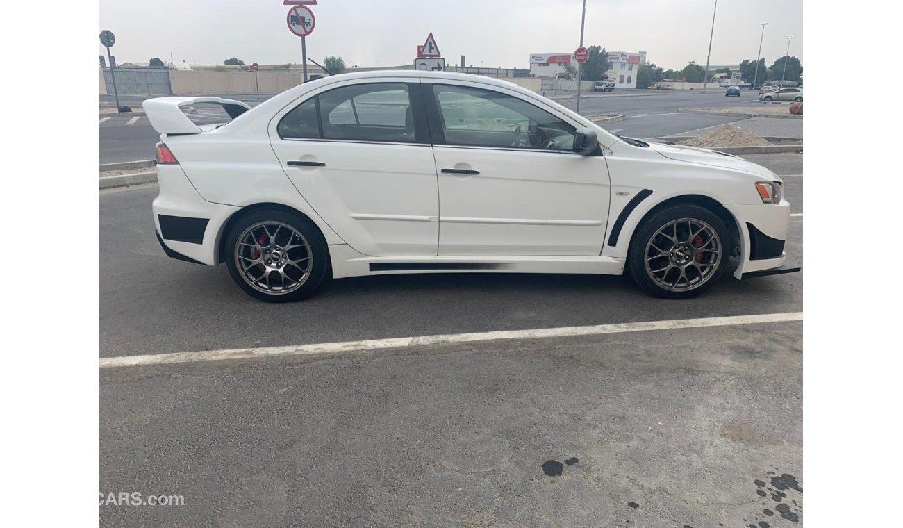 ميتسوبيشي لانسر URGENT! Lancer GT 2010 Modified with Evo kit and BBS rims