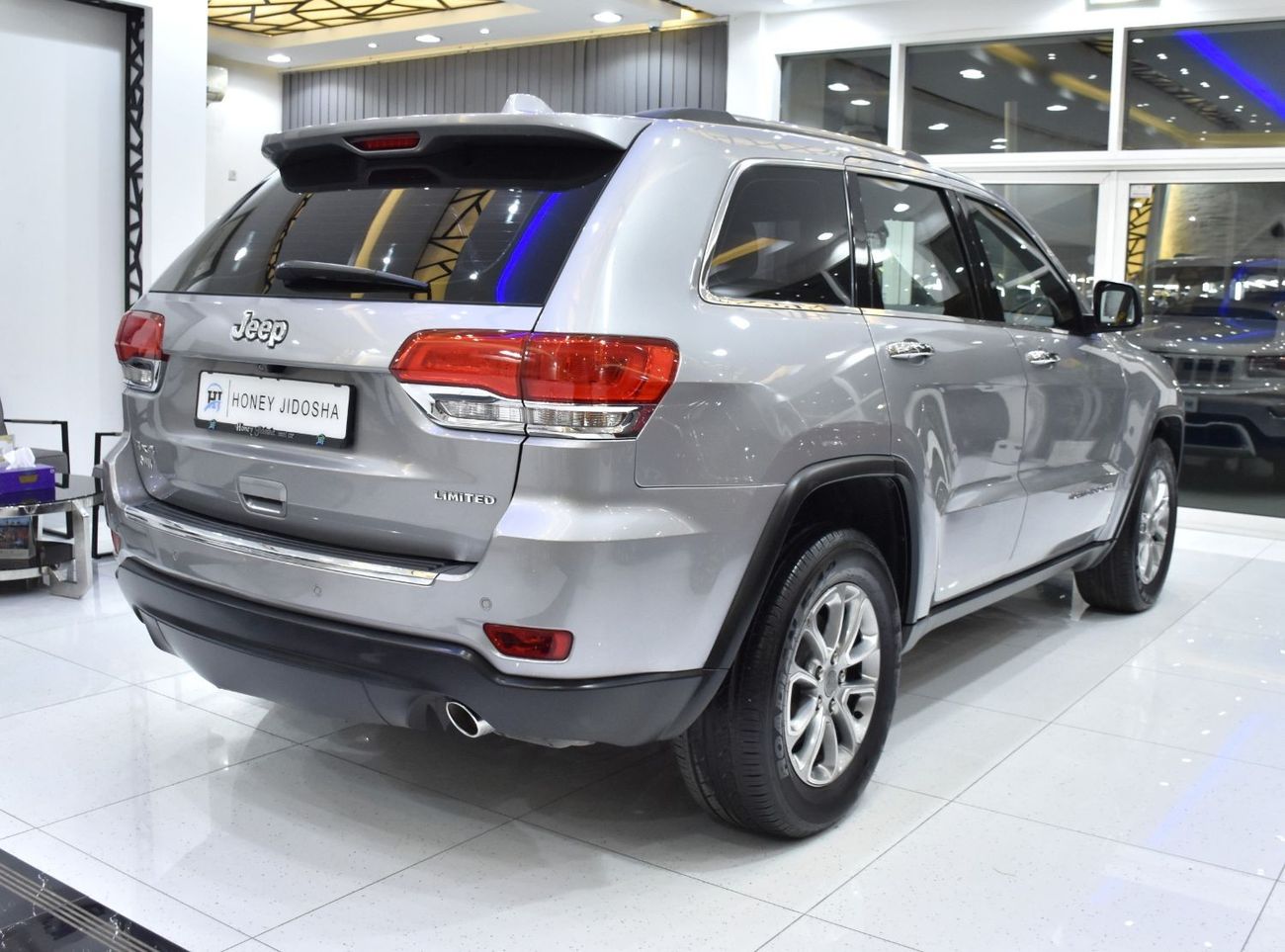 Jeep Grand Cherokee EXCELLENT DEAL for our Jeep Grand Cherokee Limited 4x4 ( 2015 Model ) in Silver Color GCC Specs