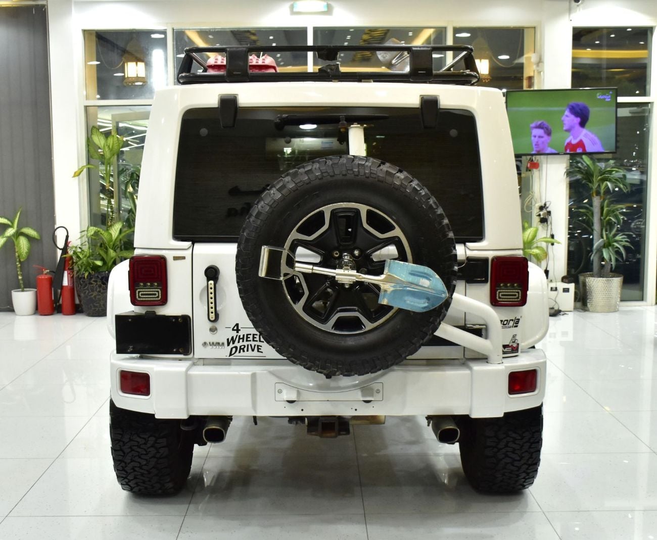 Jeep Wrangler EXCELLENT DEAL for our Jeep Wrangler Unlimited Sport ( 2014 Model ) in White Color GCC Specs