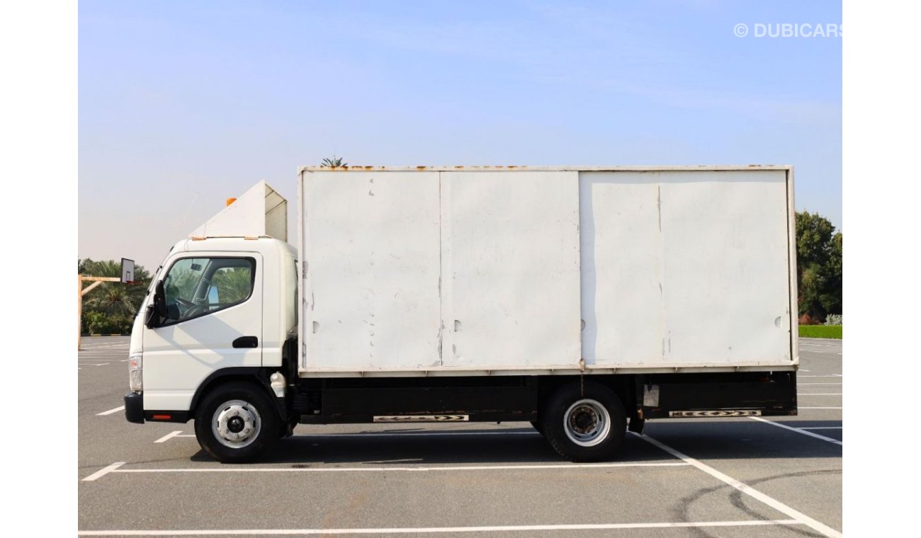 Mitsubishi Fuso Canter Water Body with Sliding Door Long Chassis 4Ton - Japan Manufactured | GCC