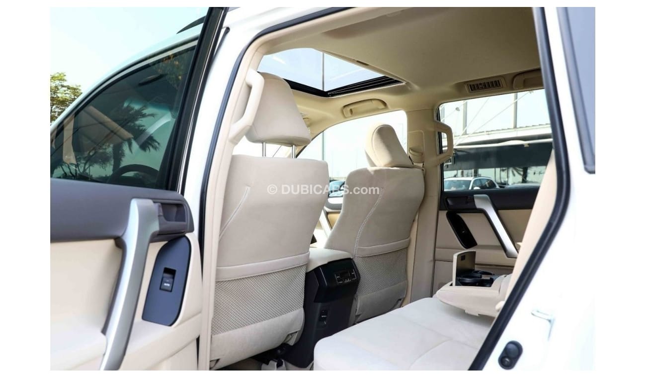 تويوتا برادو 2023 Toyota Prado 4.0 GXR DR P CB SR AT - Pearl White inside beige