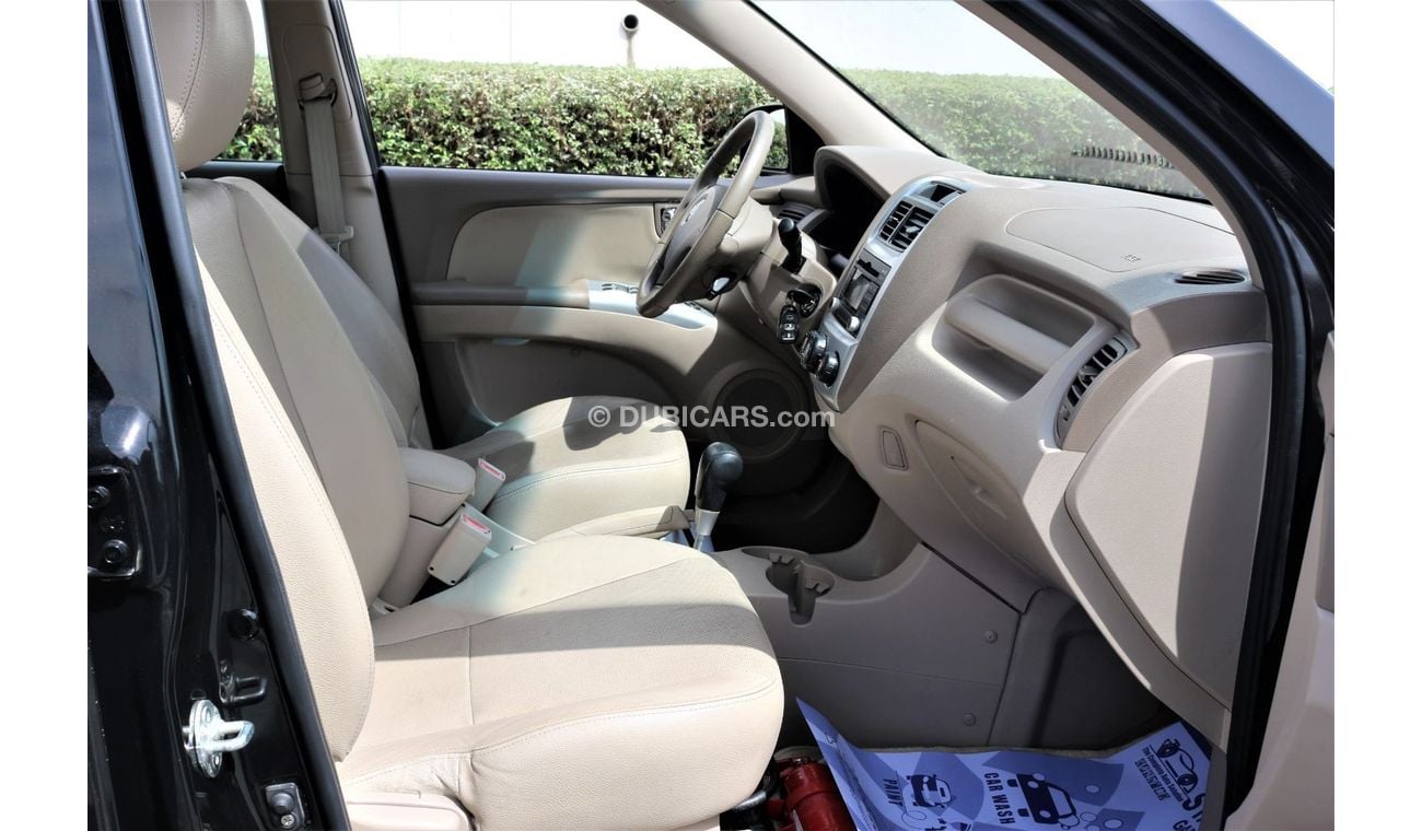 كيا سبورتيج كيا سبورتاج 2009 خليجي فل اوبشن جلد و فتحه فورويل 2700 سي سي