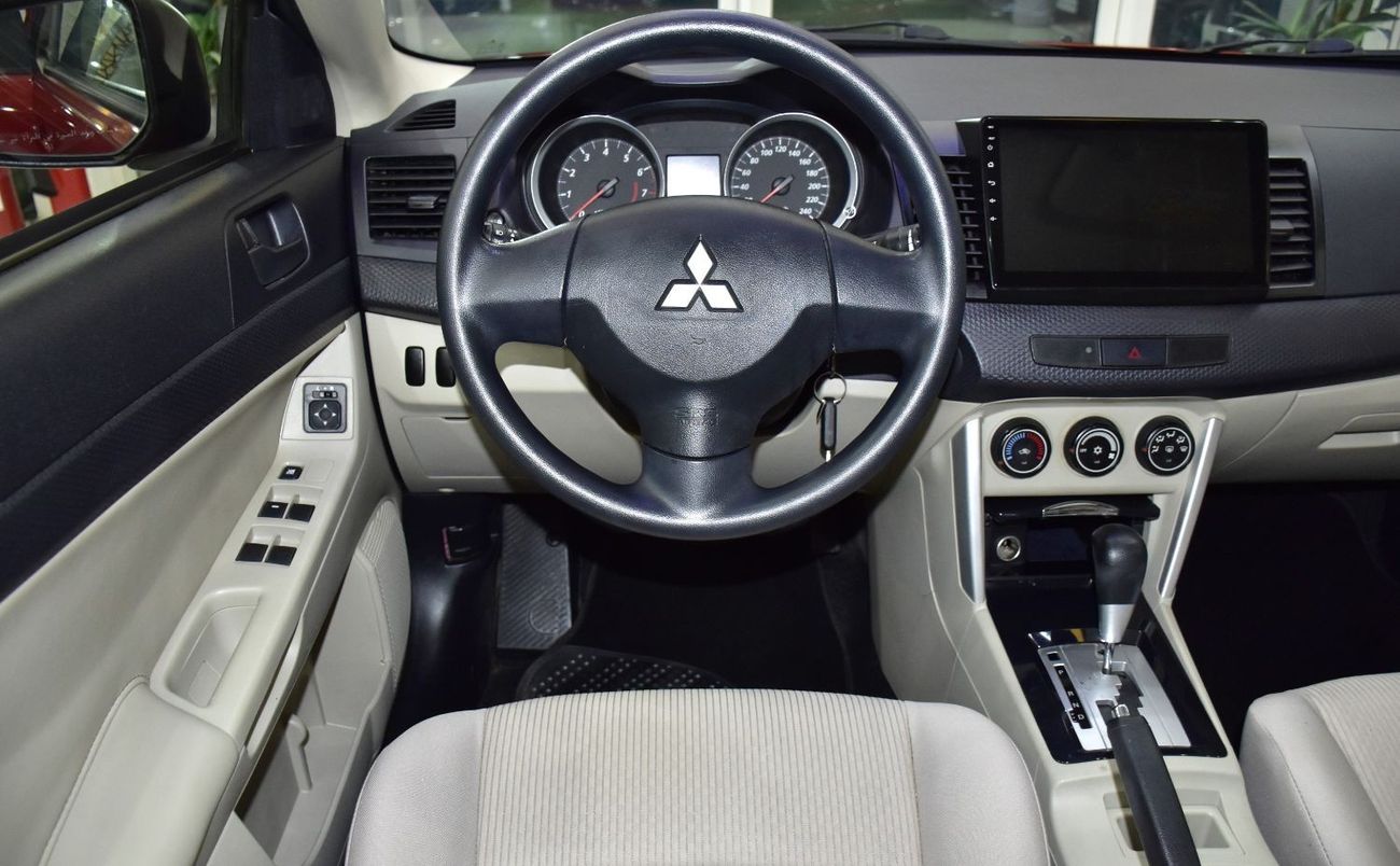 Mitsubishi Lancer EX EXCELLENT DEAL for our Mitsubishi Lancer EX ( 2016 Model ) in Red Color GCC Specs