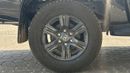 Toyota Hilux 2.7L V4  4*4 Automatic • Black Rims & Red Interior