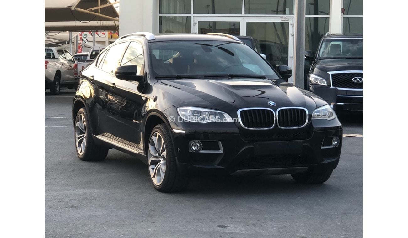 بي أم دبليو X6 موديل 2014 خليجي فل مواصفات كراسي جلد ومثبت سرعه وتحكم كهربي كامل ونظام صوت ممتاز وكاميرا خلفيه ومدخ