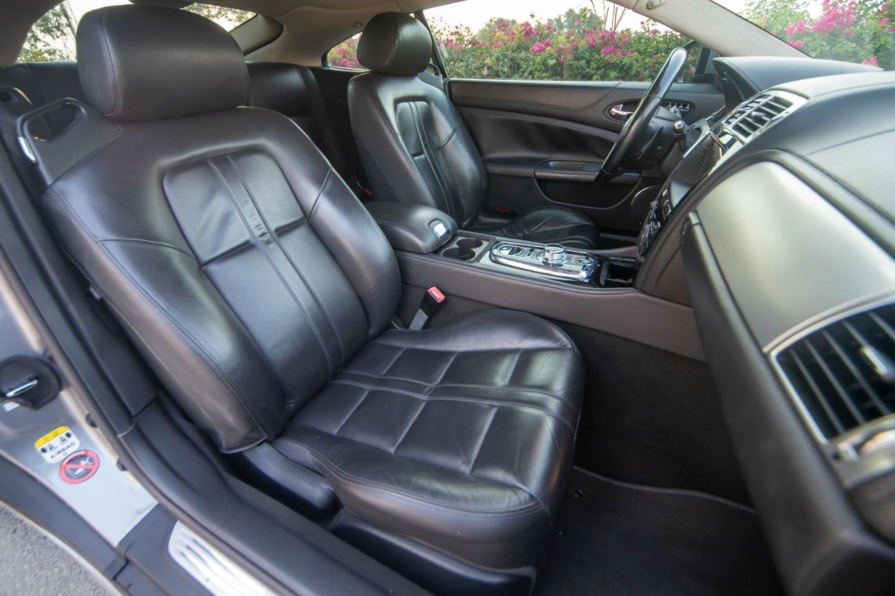 جاكوار XK Engine: 5.0L V8 | Power: 385 HP @ 6,500 RPM | Torque: 380 lb-ft @ 3,500 RPM