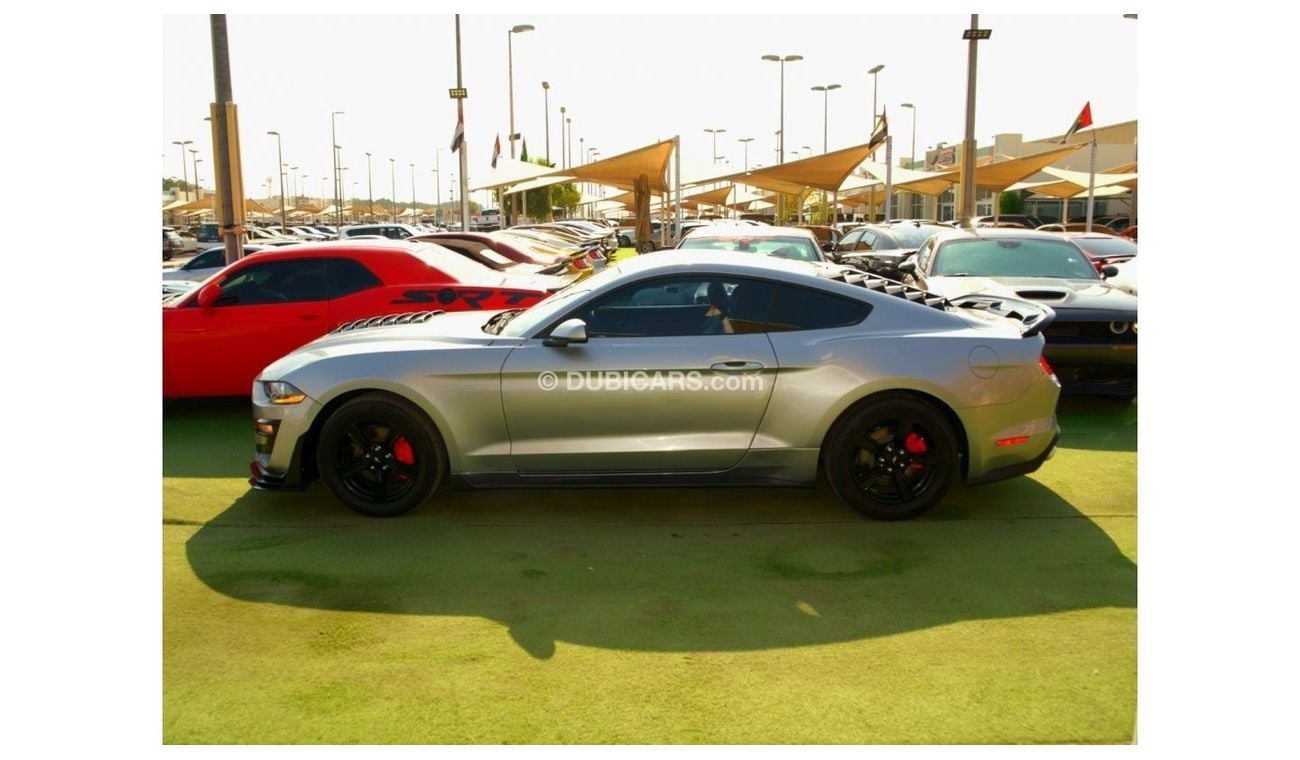 Ford Mustang EcoBoost Premium Mustang EcoBoost is powered by a 2.3-liter turbocharged four-cylinder engine with 3