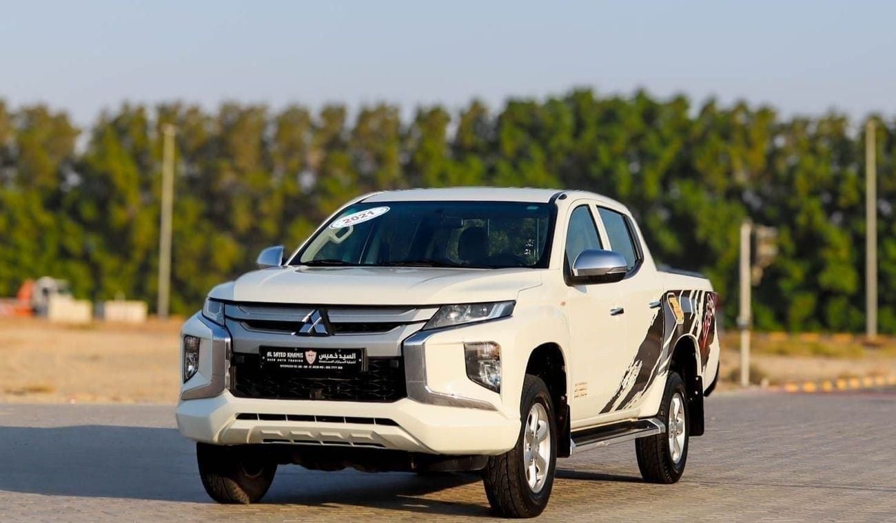 Mitsubishi L200 GLX 2.4L Mitsubishi L200 2.4 L 2021 GCC accident free in excellent condition 1303 P.M