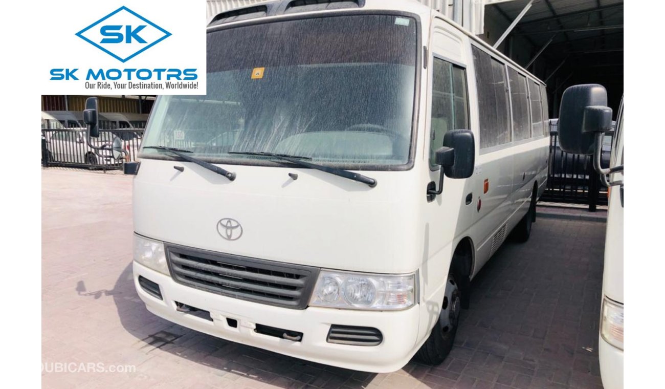 Toyota Coaster 4.2L Diesel, DVD + Rear Camera, Manual, MP3 Interface, DVD, CD Player, Tuner Radio, PARA ANGOLA