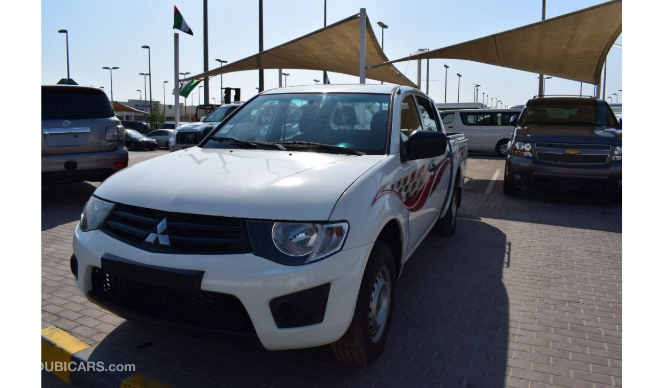 Mitsubishi L200 Std Mitsubishi L200 D/c Pick up 4x2 Diesel, Model:2012. Excellent condition