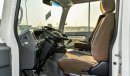 Toyota Coaster 4.2L V6 M/T Diesel 23 passengers - 16″ wheels - brown interior