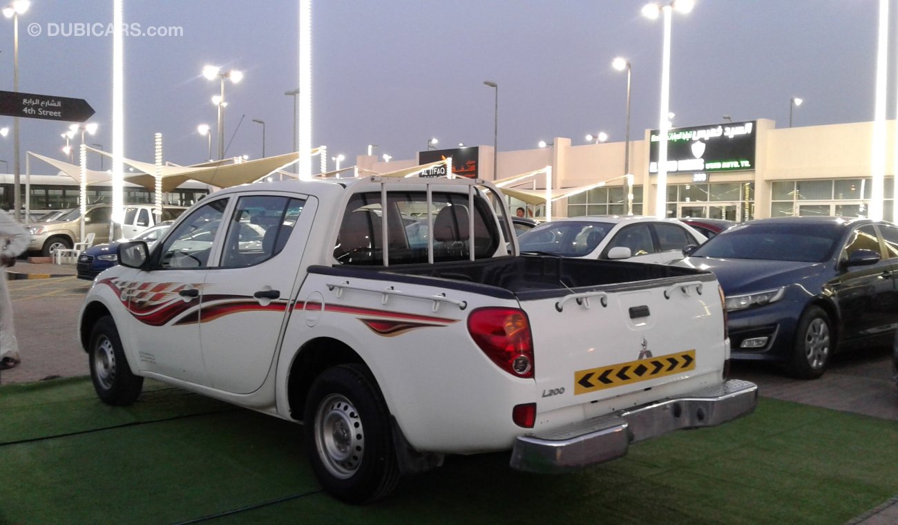 Mitsubishi L200 L200 WHITE 2014 KHALIGE NO ACCEDINT PERFECT