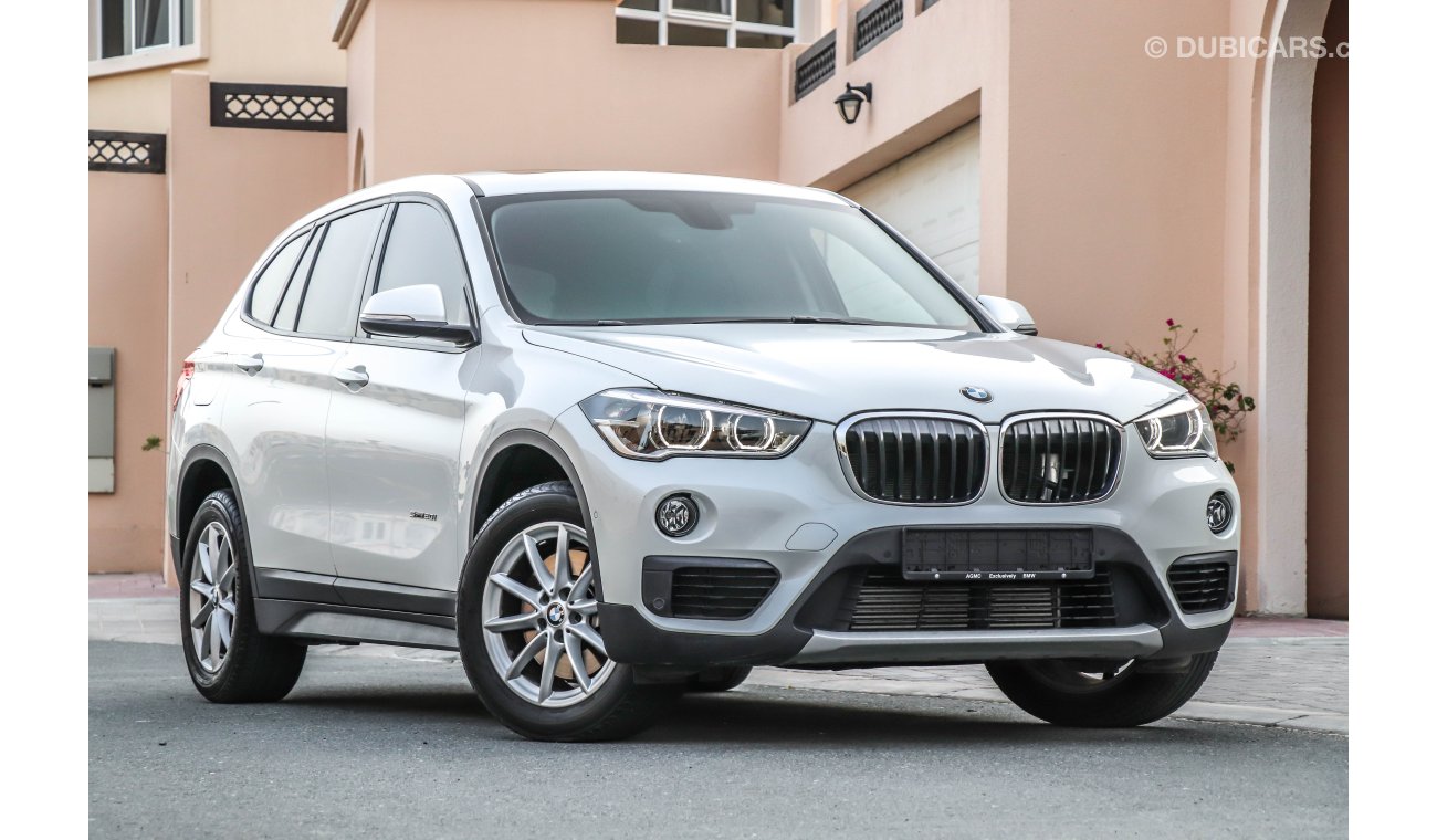 BMW X1 S-Drive 20i 2016 GCC under Agency Warranty with Zero Down-Payment.