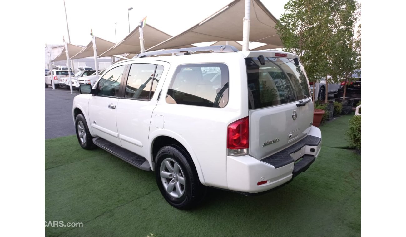 Nissan Armada Gulf model 2009  SE paint agency number one slot control unit in excellent condition