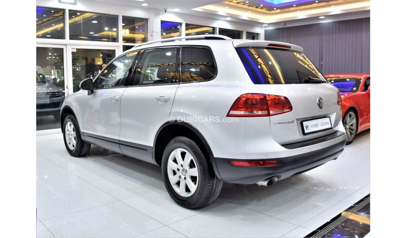 Volkswagen Touareg EXCELLENT DEAL for our Volkswagen Touareg ( 2012 Model ) in Silver Color GCC Specs