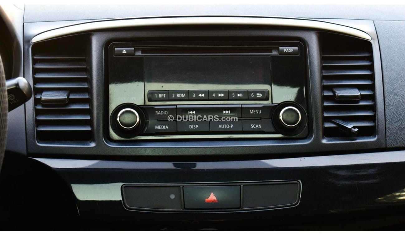 Mitsubishi Lancer 1600 CC, 2016 model, Gulf silver color, rear wing hatch, alloy wheels, FM radio, power conditioning,