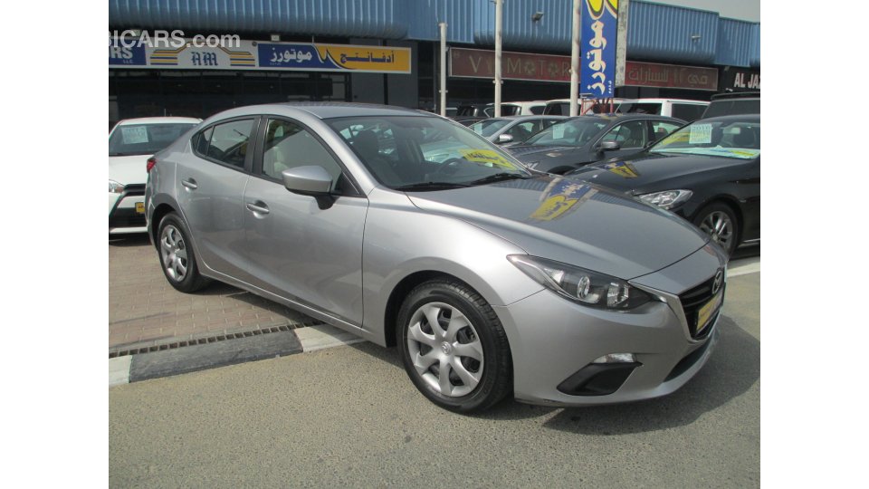 Mazda 3 1.6L for sale AED 29,000. Grey/Silver, 2015