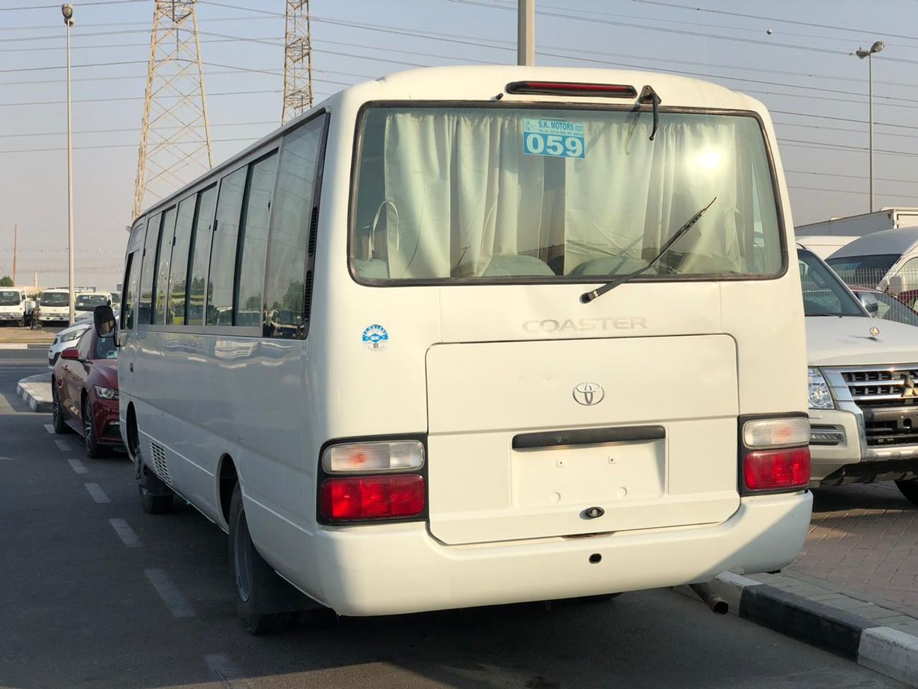 Toyota Coaster 4.2L Diesel, Automatic Door, Clean Interior and Exterior, SPÉCIALEMENT POUR LE CONGO, LOT-TCW05