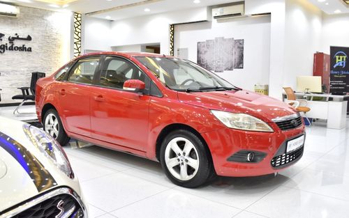 Ford Focus EXCELLENT DEAL for our Ford Focus ( 2010 Model ) in Red Color GCC Specs
