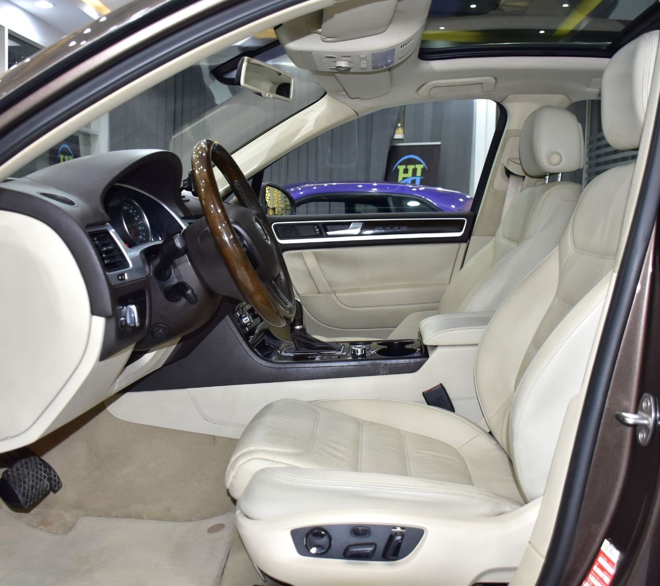 Volkswagen Touareg SEL EXCELLENT DEAL for our Volkswagen Touareg ( 2015 Model ) in Brown Color GCC Specs