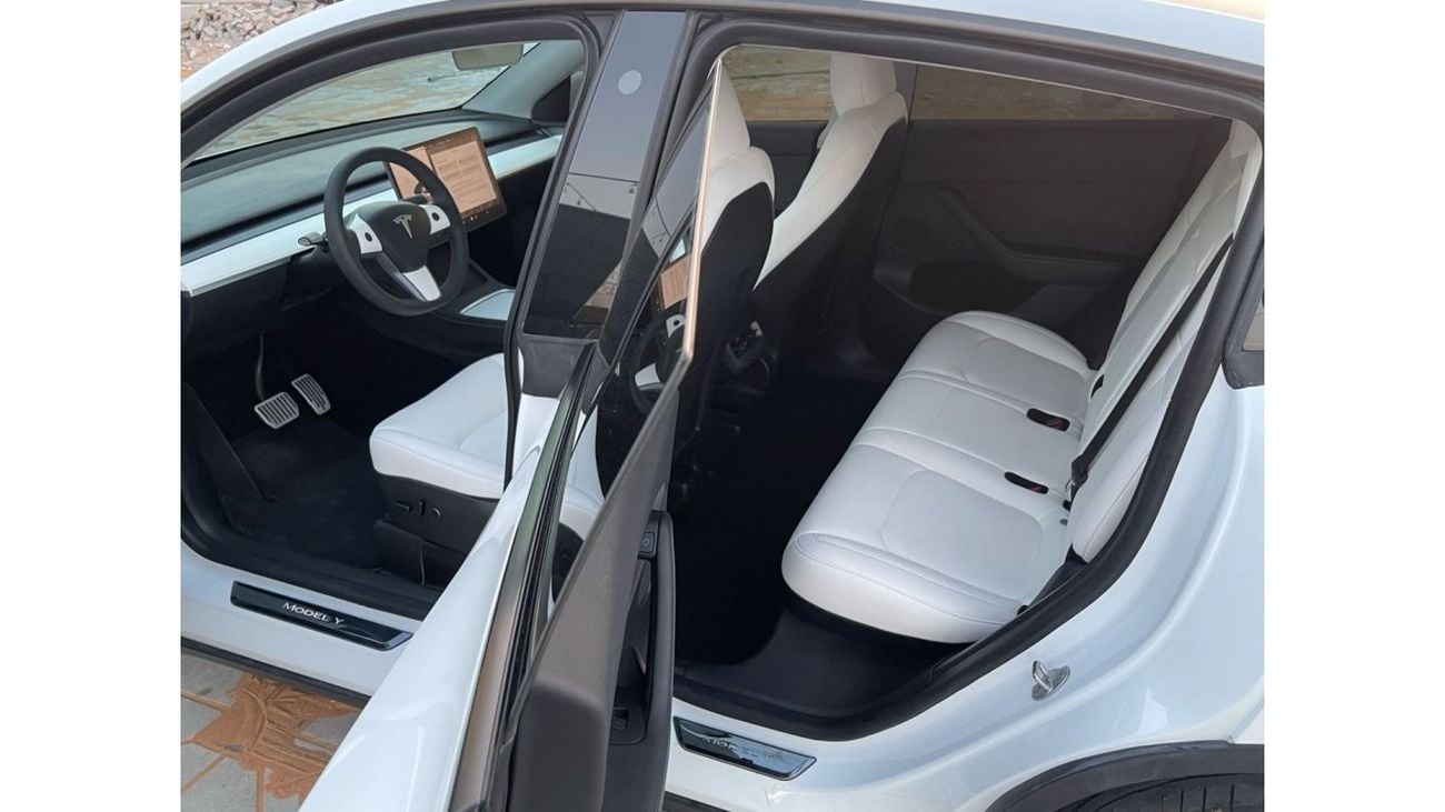 Tesla Model Y TESLA MODEL Y LONG RANGE DUAL MOTOR MODEL : 2023 MILEAGE : 24,000 km PRICE : 172,000 DIRHAMS Gulf sp