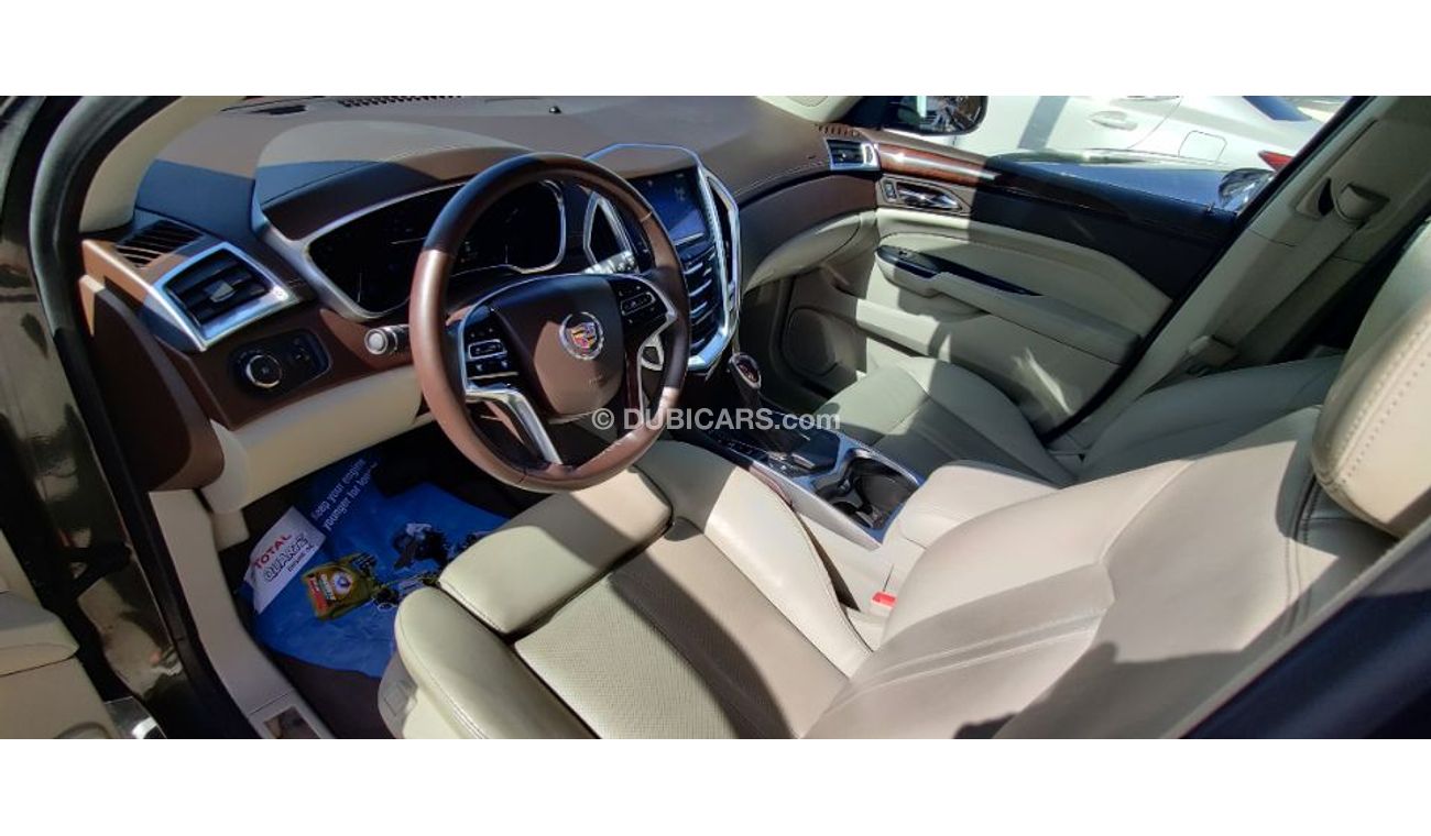 Cadillac SRX 2014 model GCC specs full options panorama clean car 3.6ltr