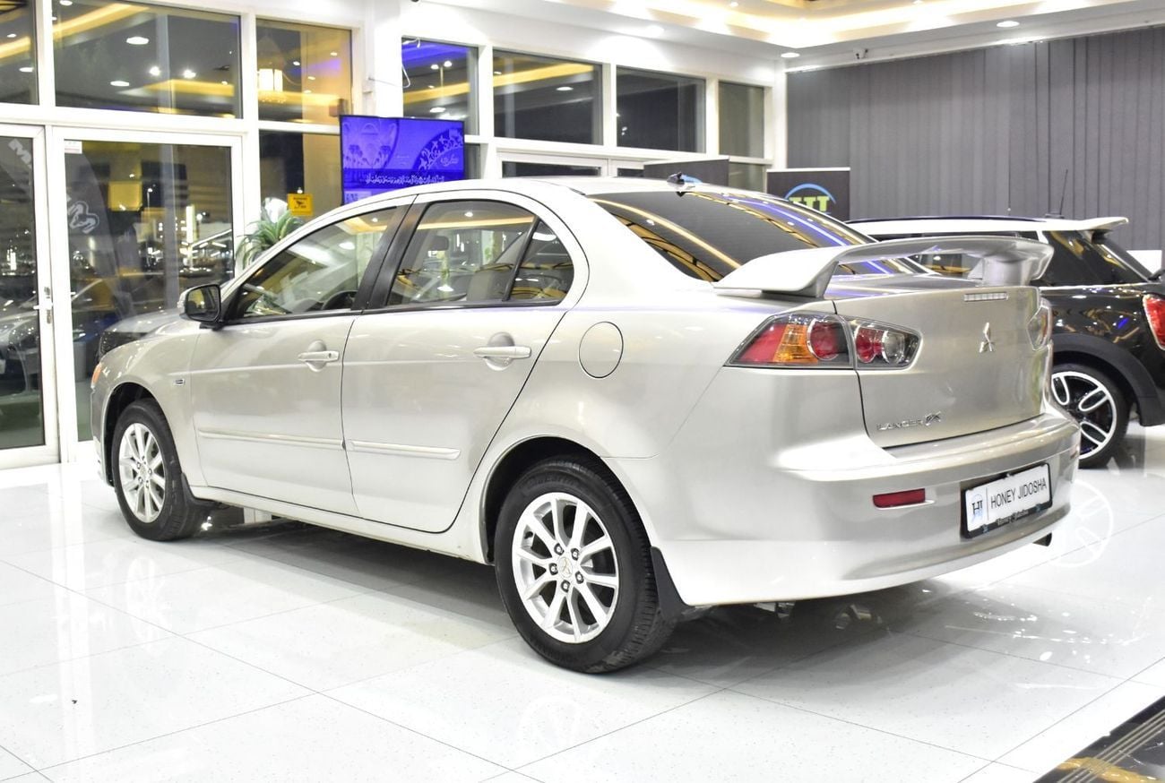 Mitsubishi Lancer EX EXCELLENT DEAL for our Mitsubishi Lancer EX ( 2015 Model ) in Beige / Silver Color GCC Specs
