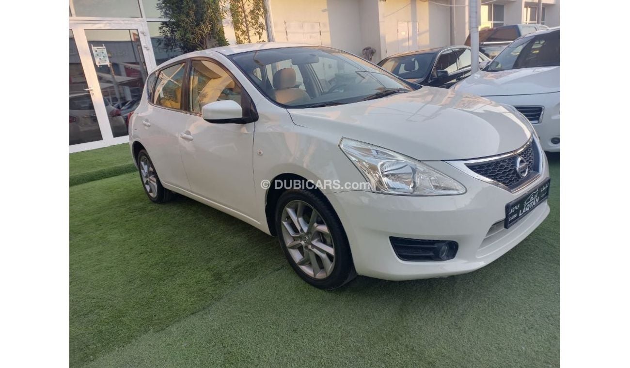 نيسان تيدا خليجى موديل 2013 لون أبيض شاشة كاميرا خلفية بدون حوادث بحالة ممتازة لاتحتاج لأى مصاريف