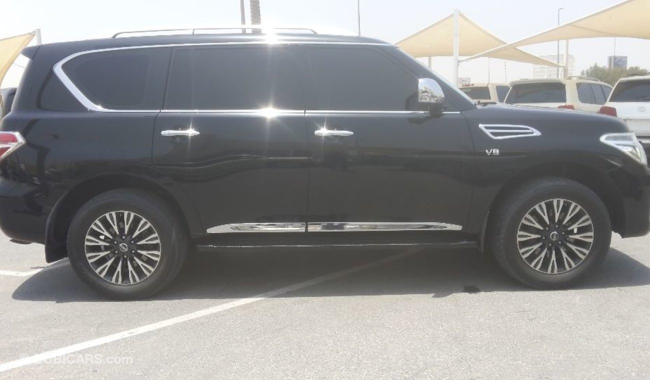 Nissan Patrol بلاتينيوم فل ابشن صبغة وكاله بحاله ممتاذه