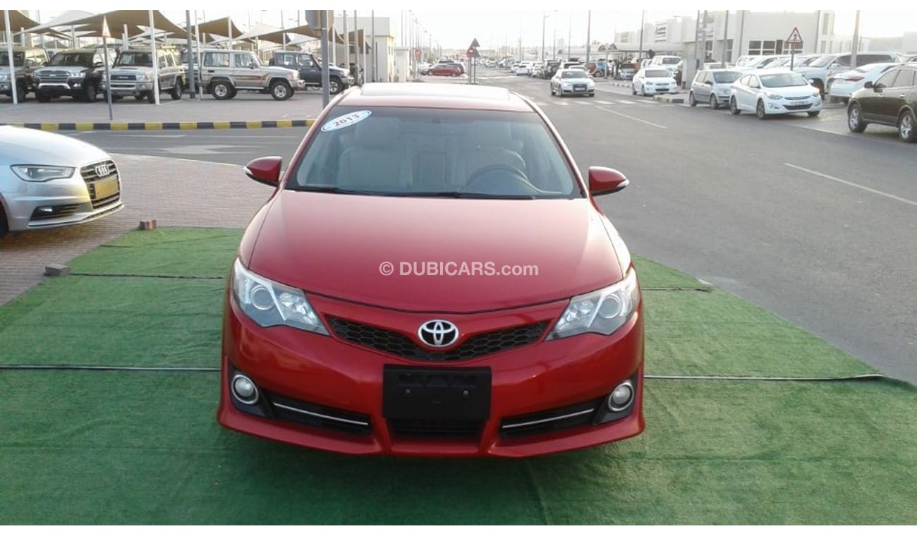 تويوتا كامري تويوتا كامرى عنابى خليجى 2013 فتحة سقف فول ابشن بحالة جيدة