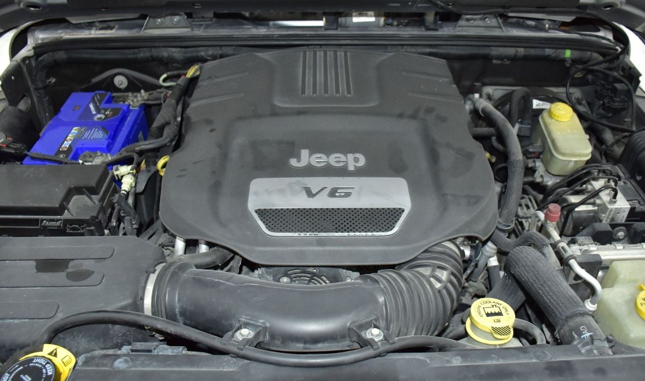 Jeep Wrangler EXCELLENT DEAL for our Jeep Wrangler Sport ( 2016 Model ) in Silver Color GCC Specs