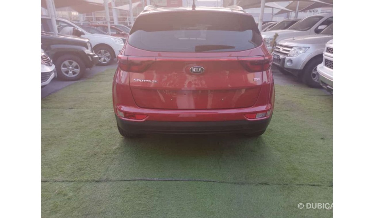 Kia Sportage 1600 CC Gulf model 2018, red color, agency, cruise control, wheels, sensors, in excellent condition,