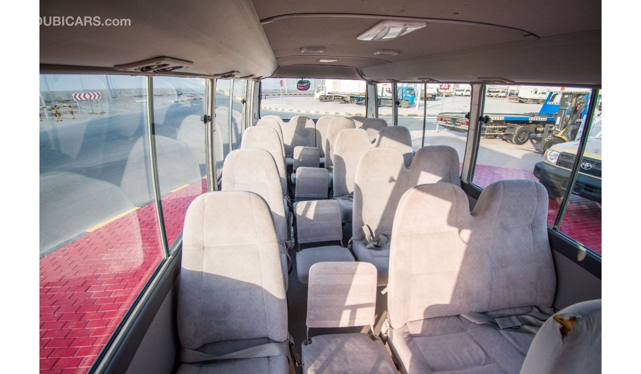 Toyota Coaster 2014 | TOYOTA COASTER | STD ROOF | 30-SEATER GCC | MANUAL TRANSMISSION | VERY WELL-MAIN