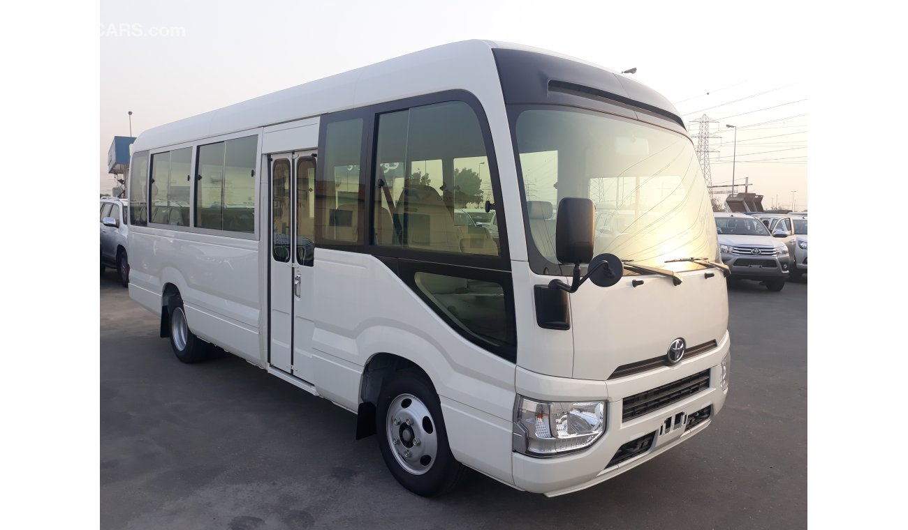 Toyota Coaster DIESEL 4.2L WITH AIR BAGS ABS AND POWER DOOR