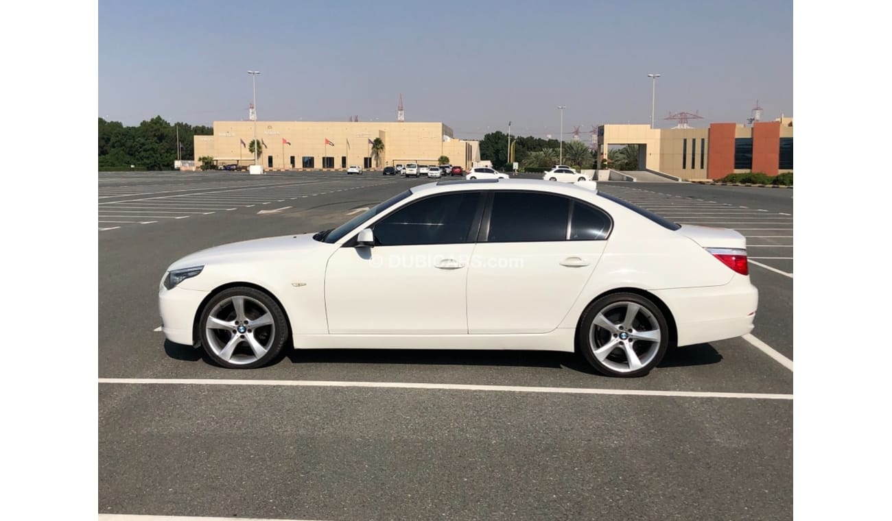 BMW 523i Model 2010 GCC car perfect condition inside and outside full option sun roof leather seats back came