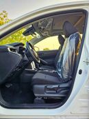 تويوتا كورولا كروس HYBRID ELITE / SUNROOF / FABRIC SEATS / 2.0L V4 PETROL (CODE # CRCHC)