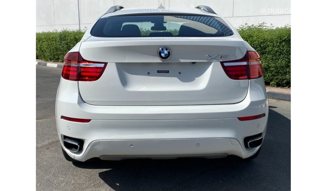 BMW X6 AED2070/month | 2014 BMW X6 XDrive50i 4.4L UNLIMITED K.M WARRANTY.
