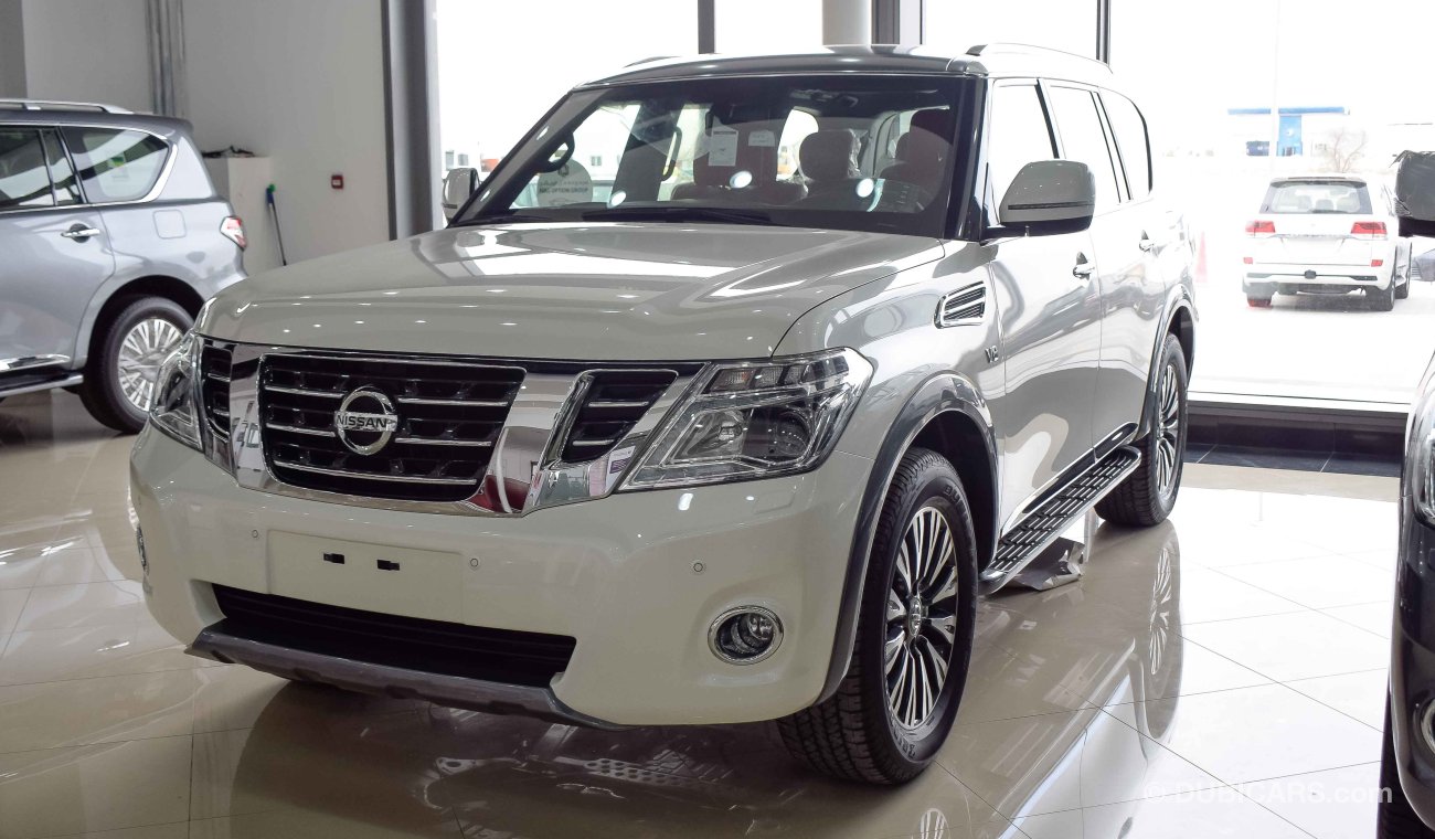 Nissan Patrol تيتانيوم بمواصفات خاصة اضاءه بالسقف