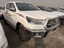Toyota Hilux 2.7L - Super White Inside Red