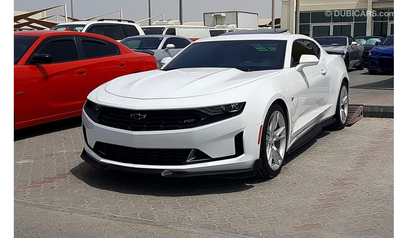 Chevrolet Camaro Chevrolet Camaro rs Model - 2021 Engine - v6 3.6L automatic gear Mileage - 13,000 White color Interi