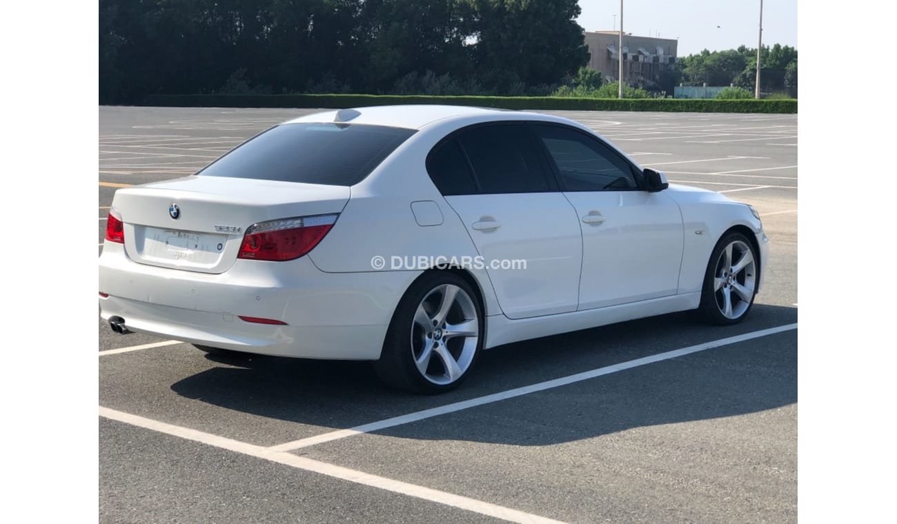 BMW 523i Model 2010 GCC car perfect condition inside and outside full option sun roof leather seats back came