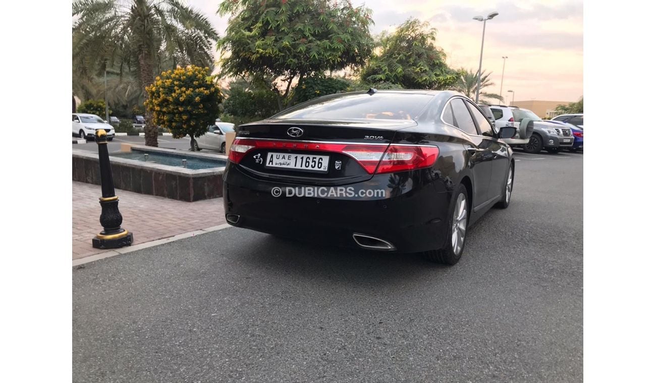 هيونداي أزيرا هيونداي ازيرا موديل 2013 خليجي صبغه وكاله فل اوبشن  بانوراما مثبت سرعه زكي كراسي جلد تبريد وتسخين